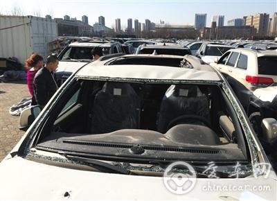 天津港爆炸受损车“洗白”入市 价格便宜20万约150辆全被拍走